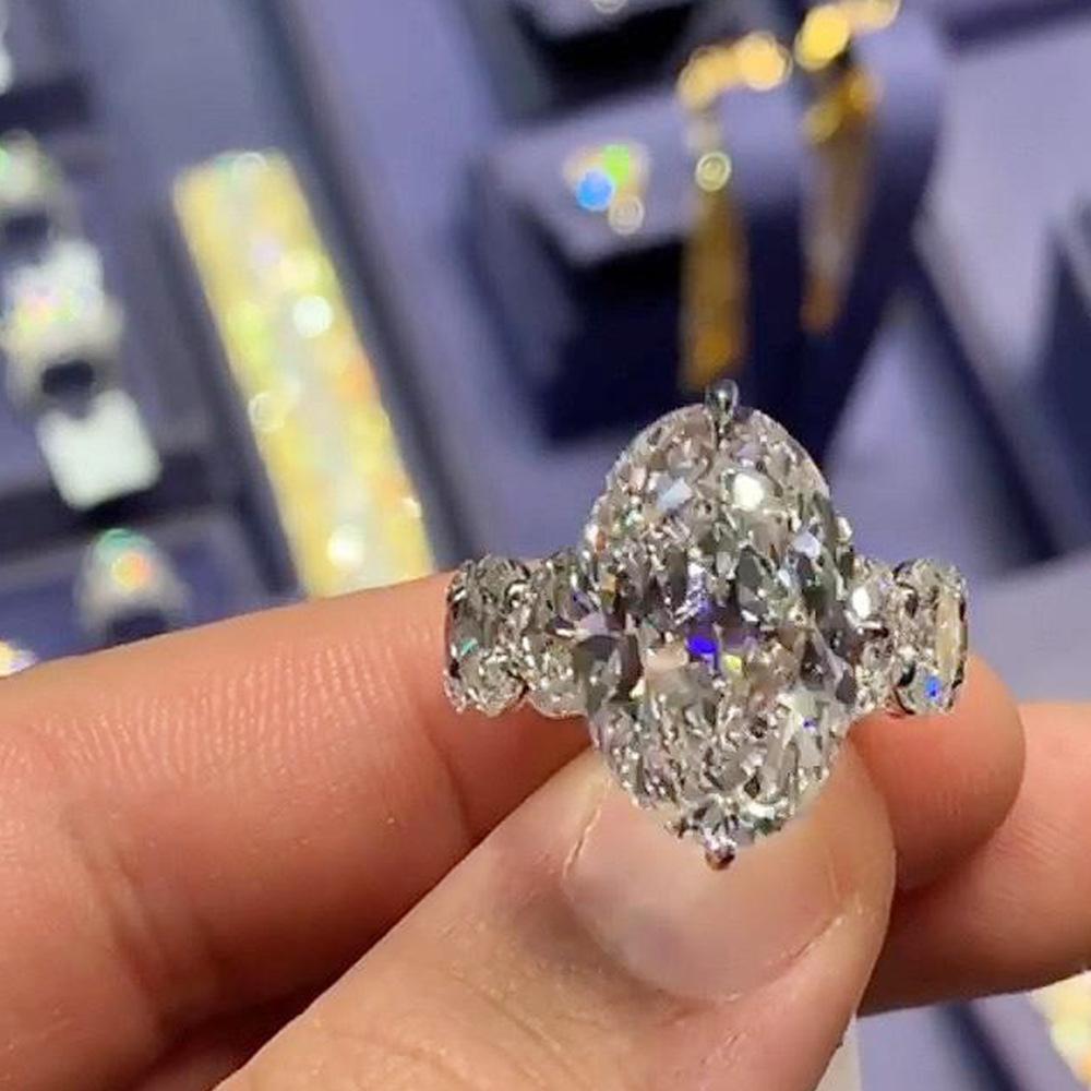 2026 Inlaid Oval Pigeon Egg Cube Zirconia Ring, Fashionable and Personalized Platinum Engagement High-quality Jewelry