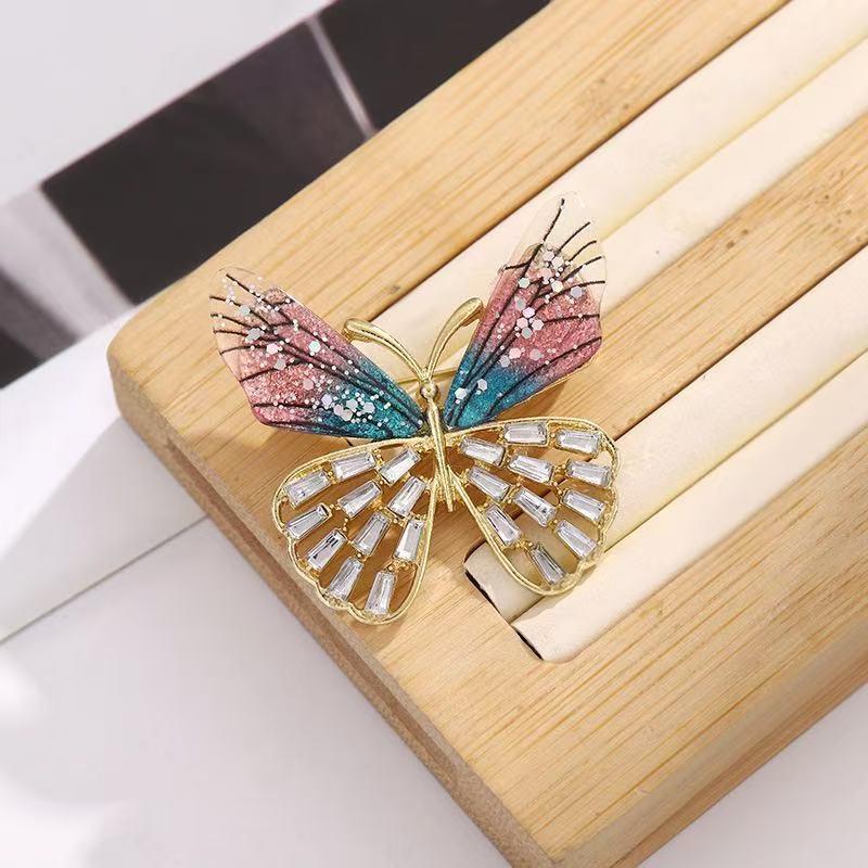 

Colorful Butterfly Women s Brooches Blue Pink Enamel Crystal Luxury Brooch for Female 2026 new trend Clothing Accessories