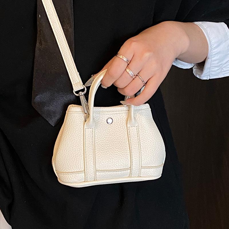 New Product Wholesale Niche Design Simple Mini Handbag Korean Personality Versatile Lychee Pattern Messenger Change Bag Woman