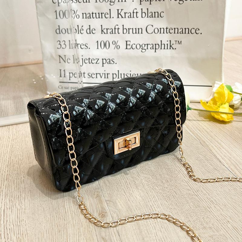 Fashion pearl shoulder jelly bag, women's versatile diamond lipstick change bag, one piece.