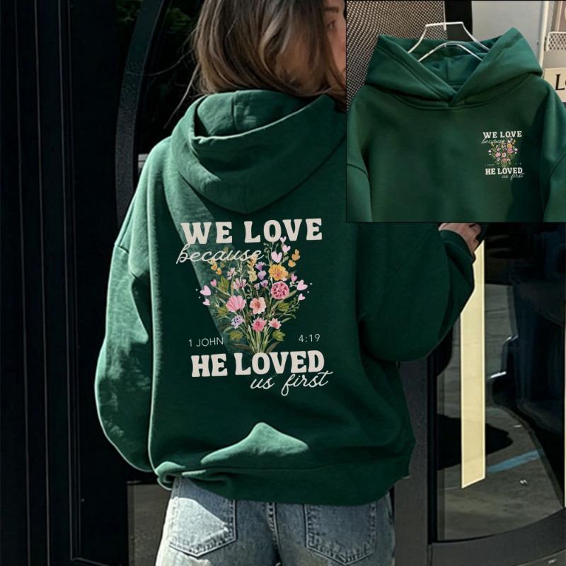 Women We Love Because He Loved Us First Wildflower Christian Graphic Hoodie Front Back Print 1 John 4:19 Bible Verse Hooded Tops