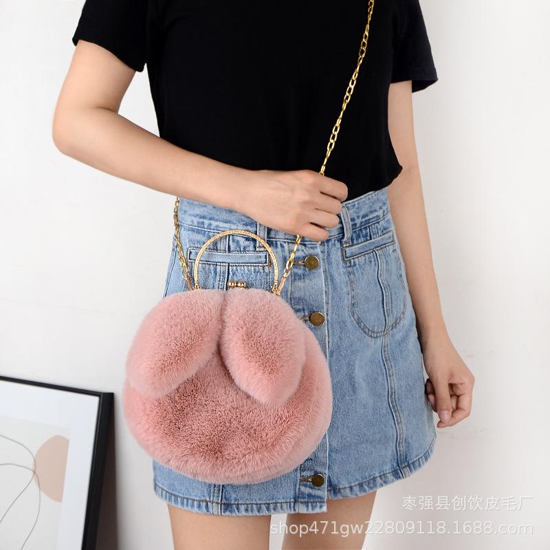 Plush rabbit bag female oblique cross Korean version cute portable fluffy bag autumn and winter new rabbit ear clip bag clip bag