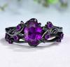 Bague bicolore noire et dorée avec zircon triangulaire vert olive