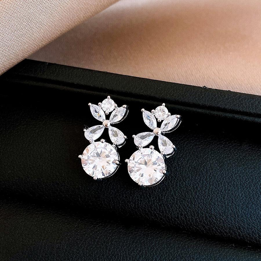Korean hollow zircon flower stud earrings temperament personality earrings light luxury earrings women