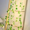 Waterproof LED Vine String Lights with Green Leaf Design for Outdoor Festivals and Parks