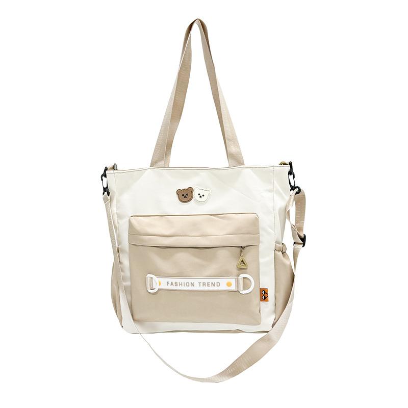 New portable shoulder bag, large-capacity student schoolbag, make-up bag, casual versatile commuter backpack, messenger bag.