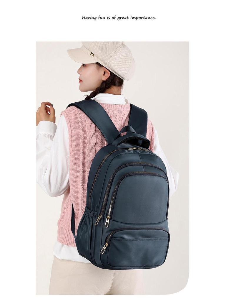 Clearance Anti-Theft Waterproof Backpack: Fashionable Oxford Cloth, Unisex, Large Capacity for Travel and Laptop