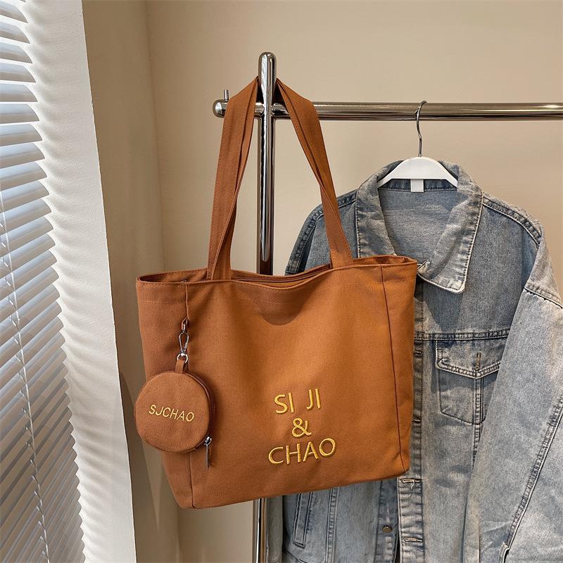Women's Large-capacity Canvas Bag, Simple Letters, Versatile Commuting Artifact.