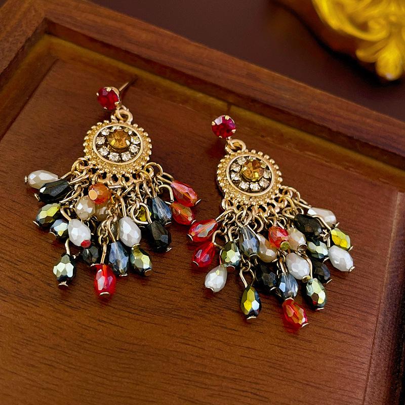 

Элегантные серьги-кисточки в стиле ретро с бриллиантами и цирконами