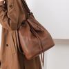 New Casual Retro Women's Backpack with Drawstring Design and Loose Fit, Large Capacity Commuting Bag for Women