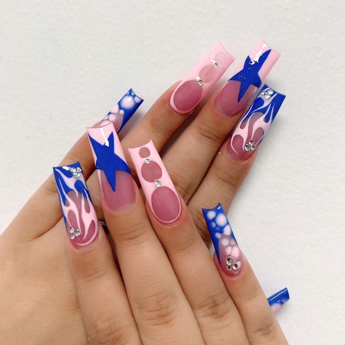 

Long Pink Tube French Nails with Blue Star Rhinestones