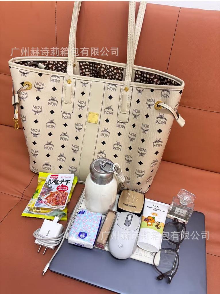 Neue MC-bedruckte Mutter-Kind-tragbare Tote-Schultertasche große Kapazität Messenger-Tasche Mode vielseitig Unterarm-Pendler-Damentasche