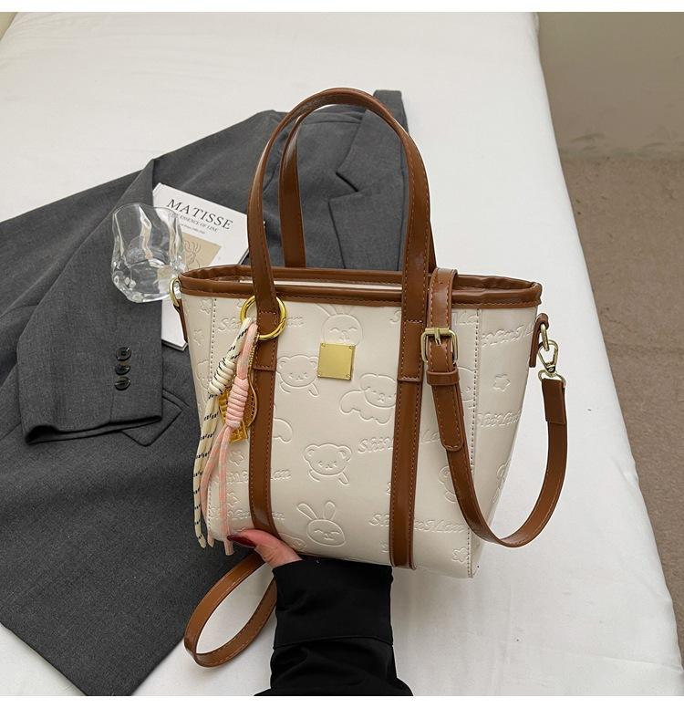 

Популярная нишевая милая и симпатичная рельефная портативная сумка-ведро для поездок на работу, повседневная, универсальная сумка-мессенджер, сумка женская