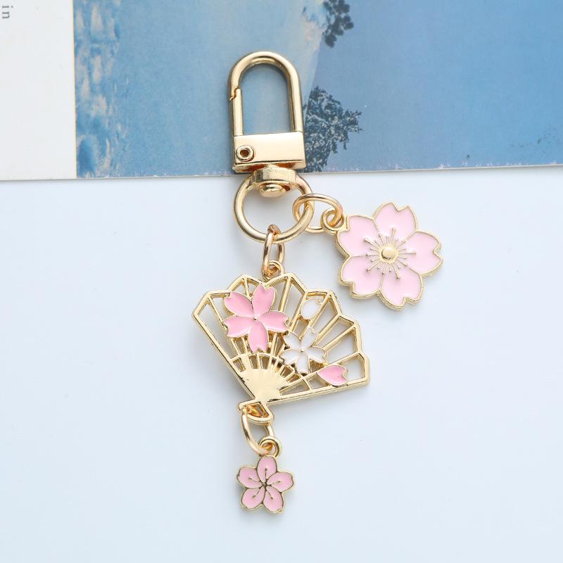 Cherry Blossom Heart Fan Keychain: Cute Gift for Car, Bag, or Bestie.
