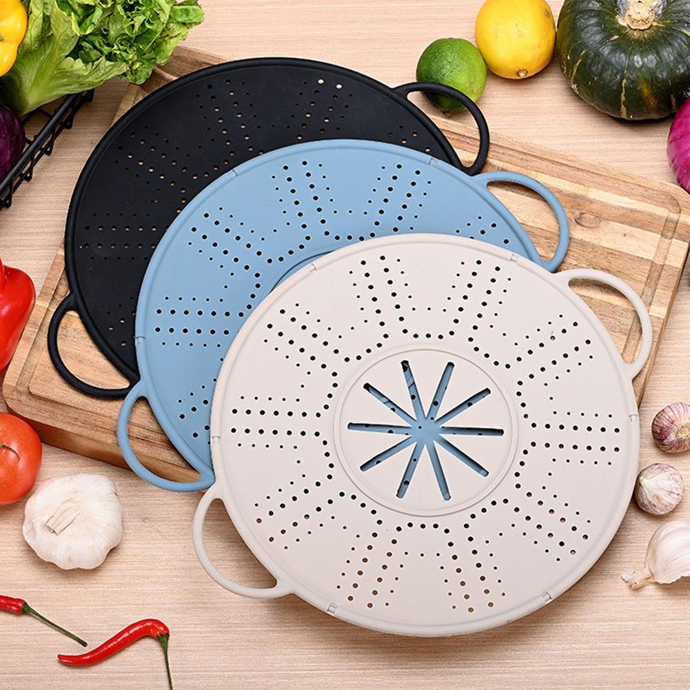 Easily Storeable Silicone Pot Holder That Doubles As a Spill Stopper Tool