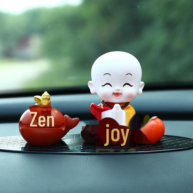 Creative Little Monk Maitreya Buddha Car Ornament: Cute, Shaking Head Resin Doll for Car Interior Decoration and Safety.