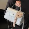 Wholesale new niche high-end sweet simple style solid color portable small square bag foreign style versatile commuter messenger bag