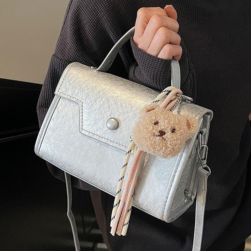 Wholesale new niche high-end sweet simple style solid color portable small square bag foreign style versatile commuter messenger bag