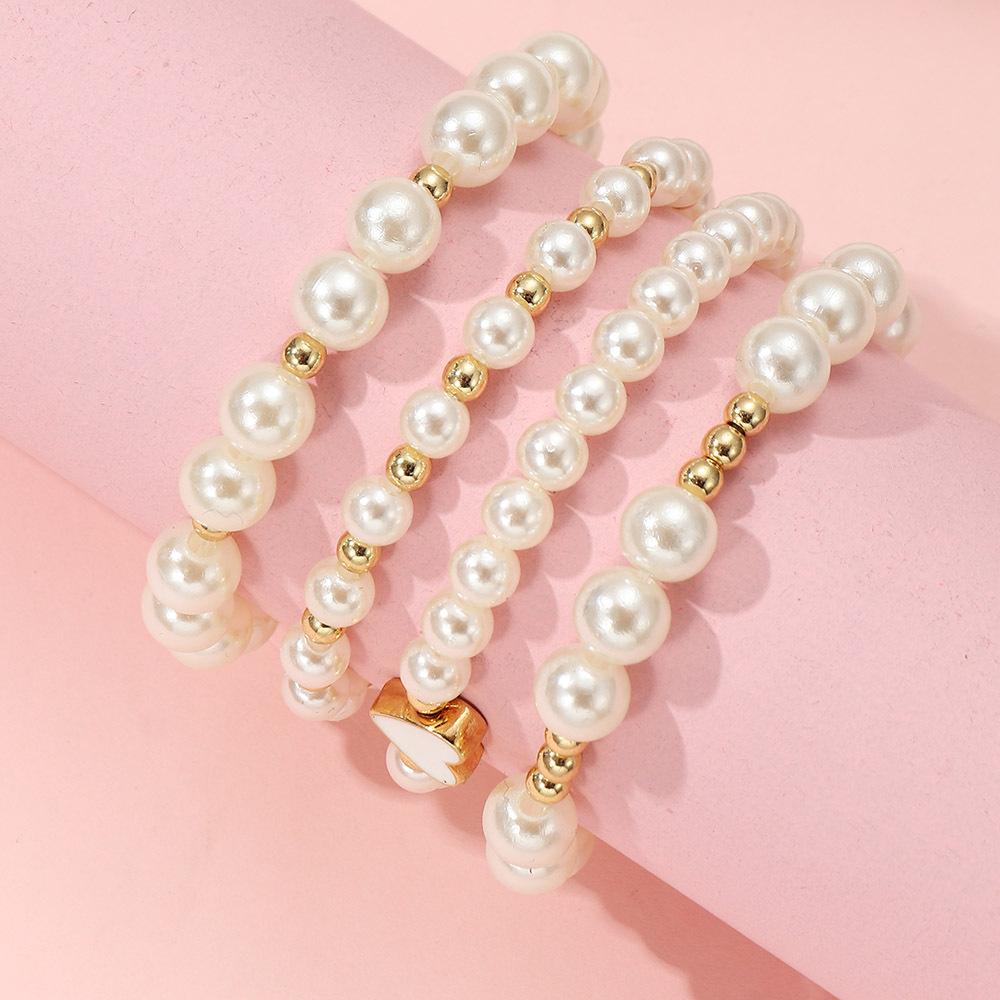 European and American New Children's Zircon Bracelet suit Little Girl Girl Love Oil Dropping Small Gold Beads Fashion Simple Four