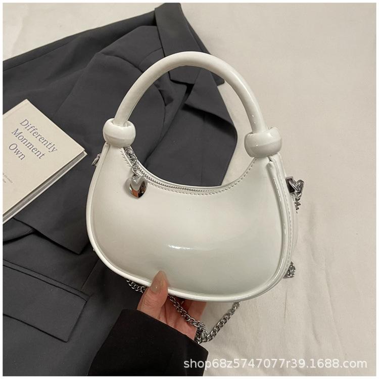 Hand-held Fashion Trend Dumpling Bag Women's 2025 New Simple and Versatile Patent Leather Shoulder Bag Niche Design Crossbody Bag
