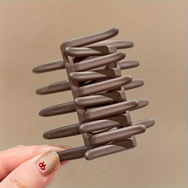 Stylish Women's Cross Ponytail Clip Medium made of durable plastic