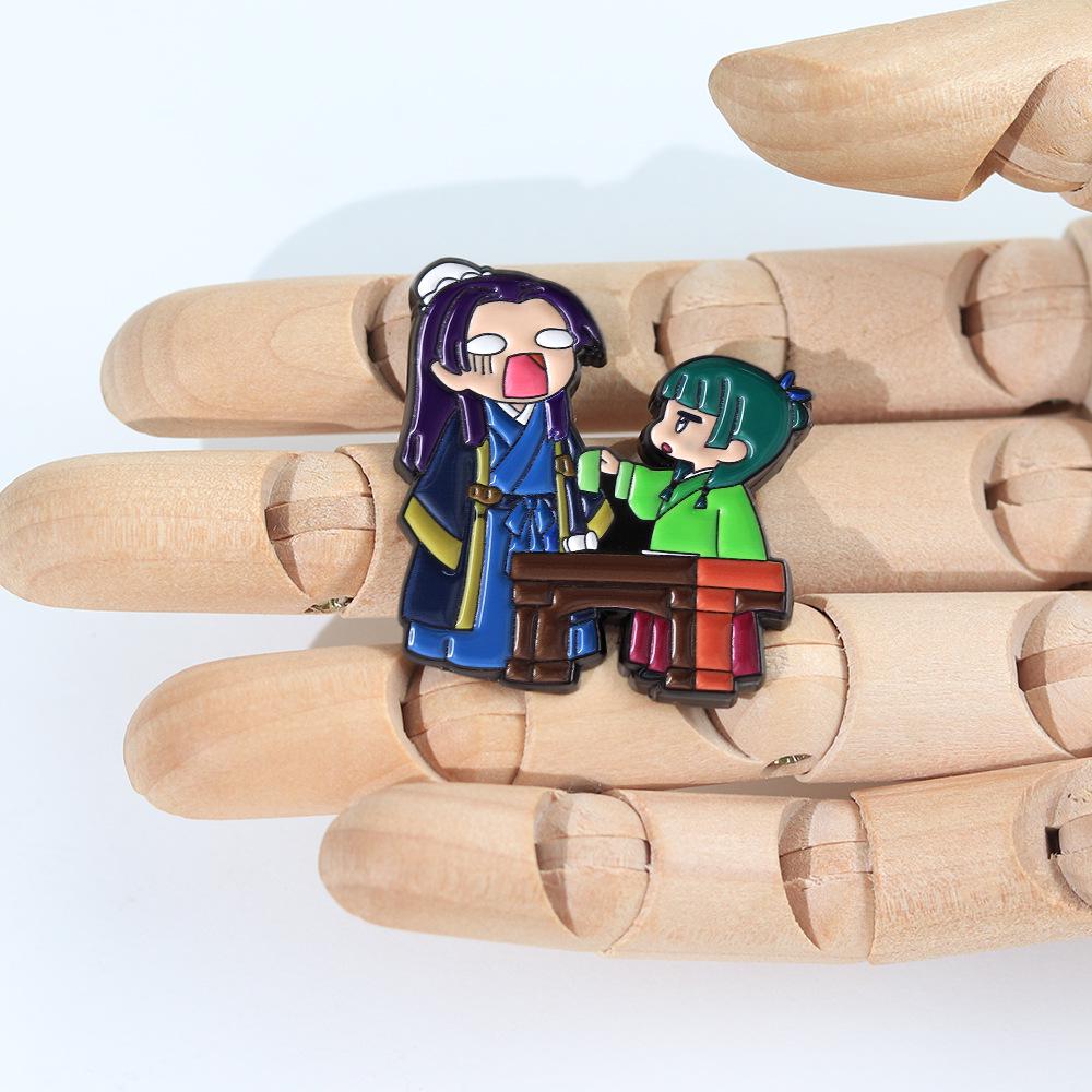 Gold Stone Fluffy Enamel Pin: Anime Couple Badge from Apothecary Diaries - Perfect Fan Gift