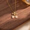 Cherry Cat's Eye Necklace: Luxury Bow Pendant, Titanium Steel Clavicle Chain for Women