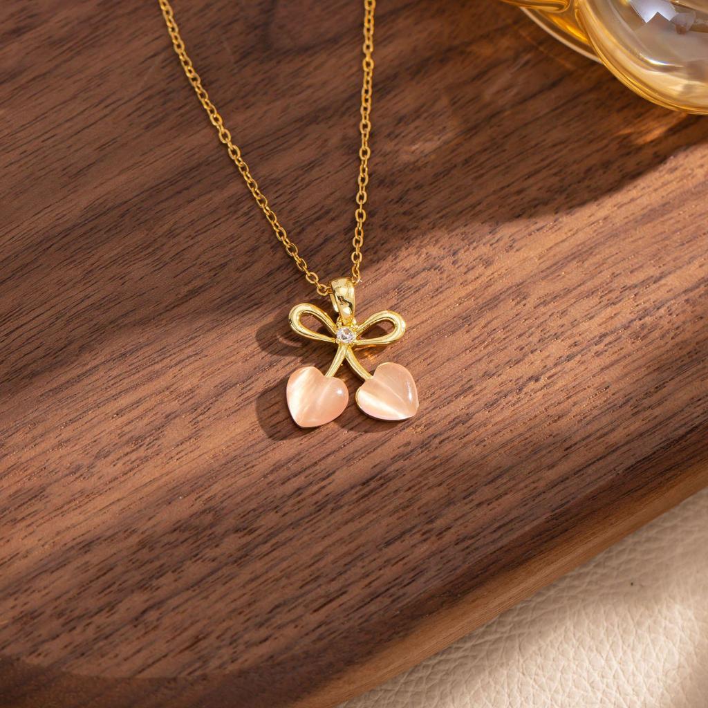 Cherry Cat's Eye Necklace: Luxury Bow Pendant, Titanium Steel Clavicle Chain for Women