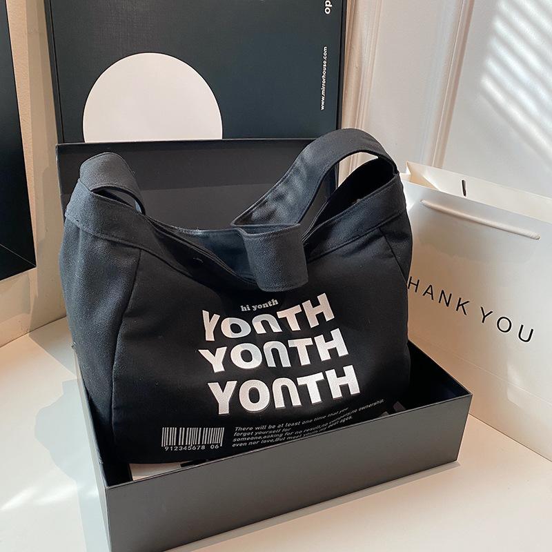 

Crossbody bag men s and women s large-capacity tote bag middle school student class schoolbag personality 2025 casual shoulder bag чёрный