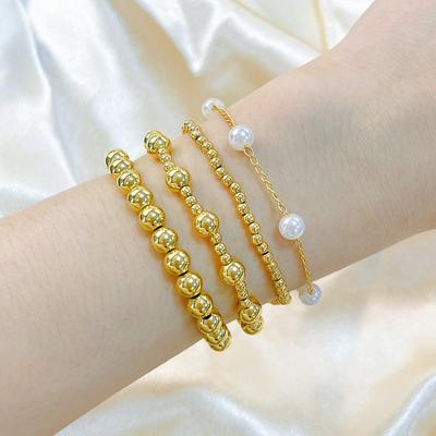 Meier Europäischer und amerikanischer Modeschmuck 18 Karat vergoldetes Perlen-Kupferperlen-Armband - ins mehrschichtig stapelbares Bangle - Exquisiter Schmuck für Frauen