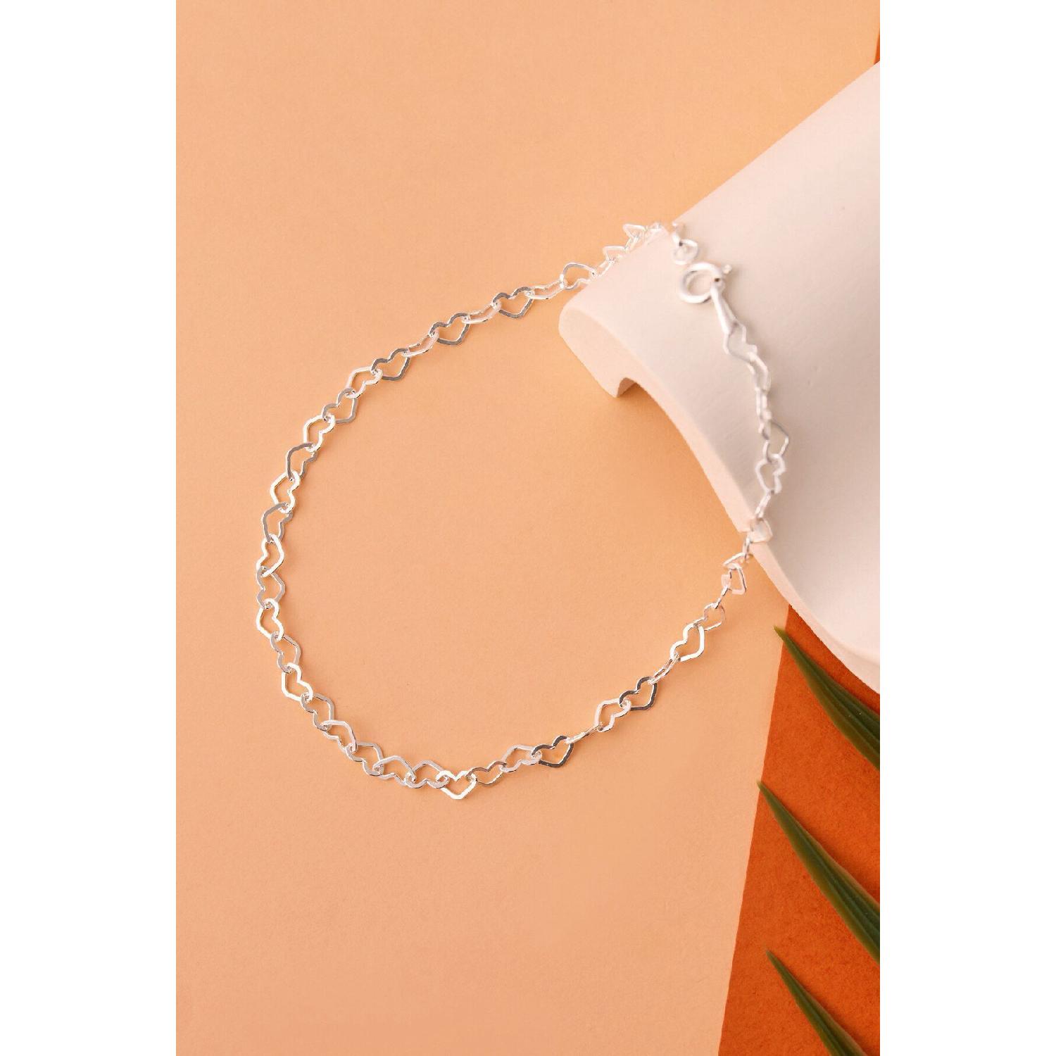 

Модельний браслет зі сріблом із зв’язаних сердець 925 проби срібний