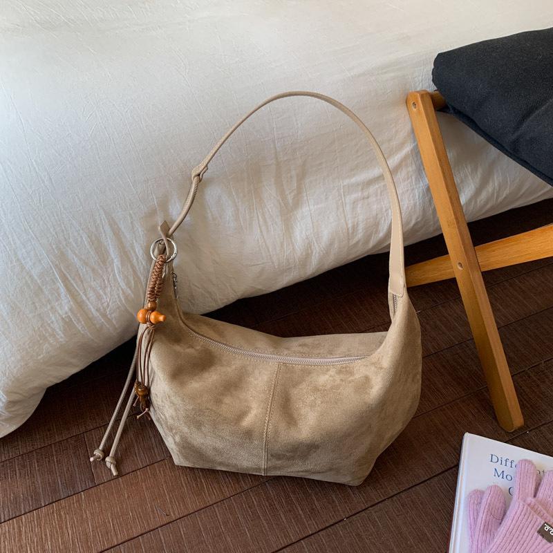 Fashion commuter high-end women's shoulder oblique straddle bag autumn retro versatile portable underarm bag