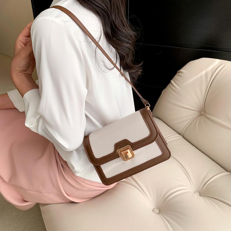 This year, the retro flip underarm bag is popular for women's 2025 new spring high-end textured shoulder square bag.