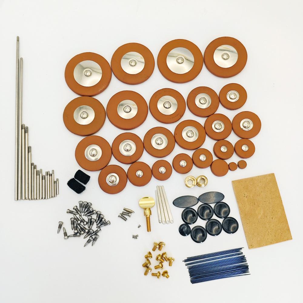Alto & Tenor Saxophone Accessory Set: Screws, Washers, Cork Pads, Reeds, Repair Parts.