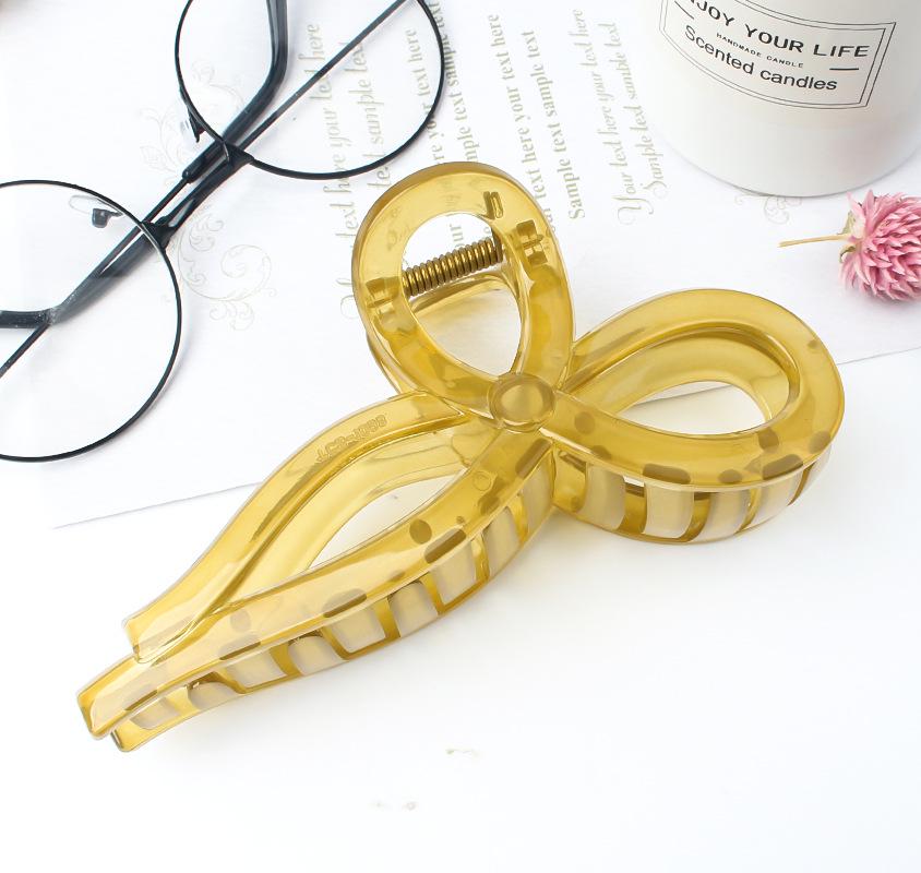 

Glossy Transparent Bow Claw Clip - Advanced Hollowed Scissor-Type Design for Fashionable Updos
