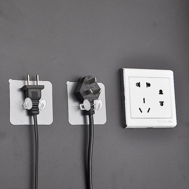 4 Stück Wandaufbewahrungshaken Stanzfrei Steckdosenhalter Küche Stealth-Haken Wandklebehänger Badezimmer Großhandel Heiß