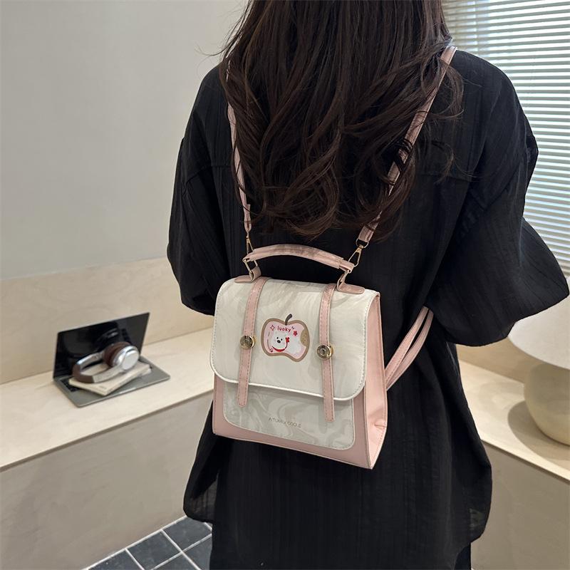 Premium sense cute sweet backpack women's new temperament commuting Korean version niche design crossbody backpack