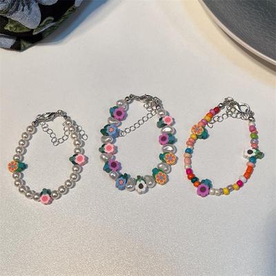 Neues buntes Blumenarmband, süßes Mädchen-Stil-Armband, geformte Perle, verstellbares Armband, Handschnur, vielseitige Handbekleidung