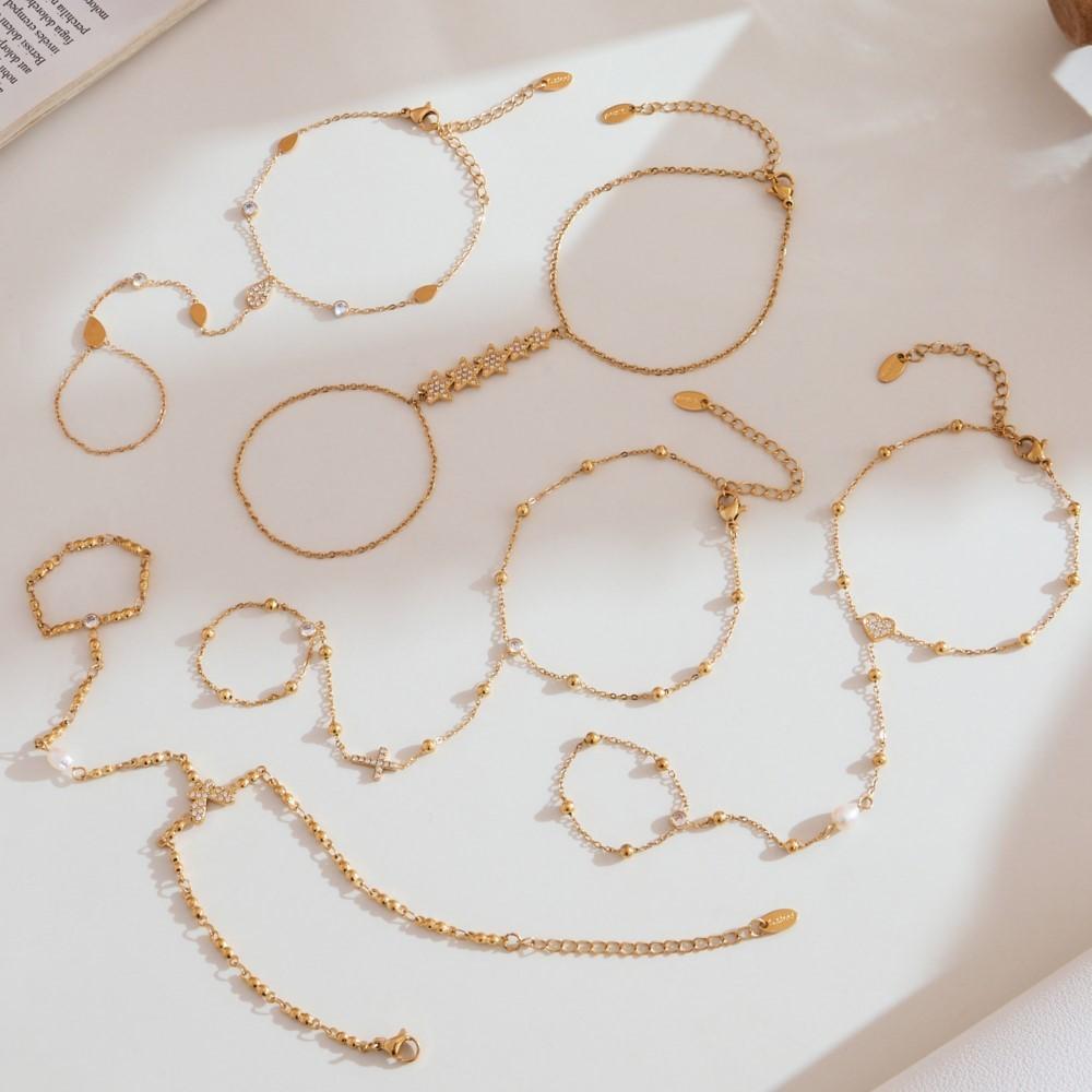 Jemný řetízek na ruku z nerezové oceli pozlacený 18k zlatem s kubickými zirkony Lesklé zirkonové řetízky na ruku pro ženy