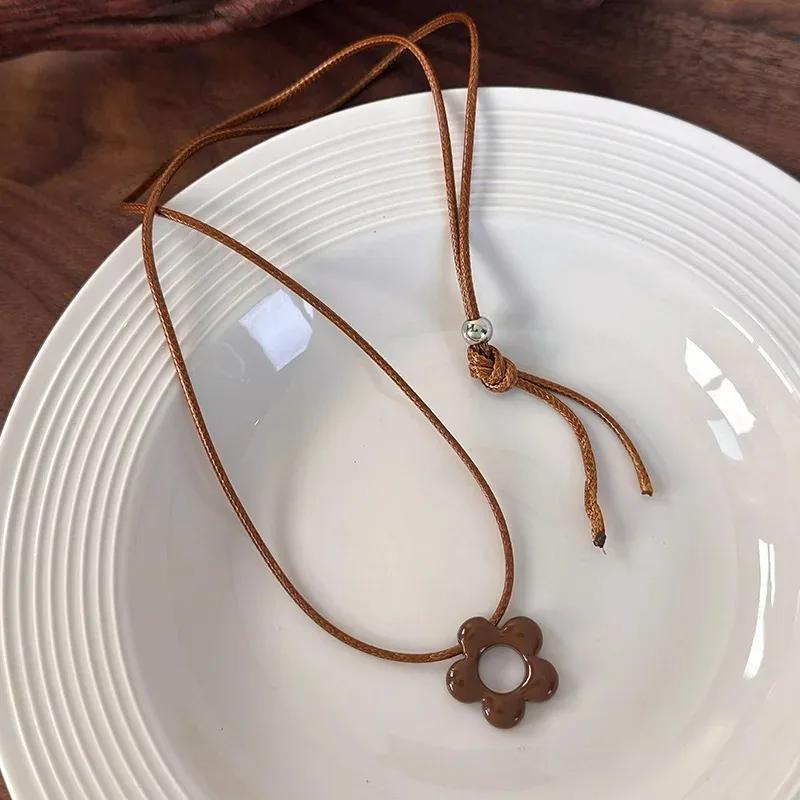 Simple Flower Long Rope Necklace Women Hollow Flower Pendant Necklace Adjustable Knot Sweater Chain Party Wedding  Gifts