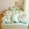 Literie Class A 2025 nouveau vent crème couleur unie drap de lit ensemble quatre pièces housse de couette étudiante ensemble quatre pièces ménage