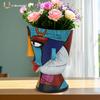Multicolor Resin Face Pot - Modern Abstract Planter with Expressive Eyes, Durable Indoor/Outdoor Vase for Home & Office Decor.