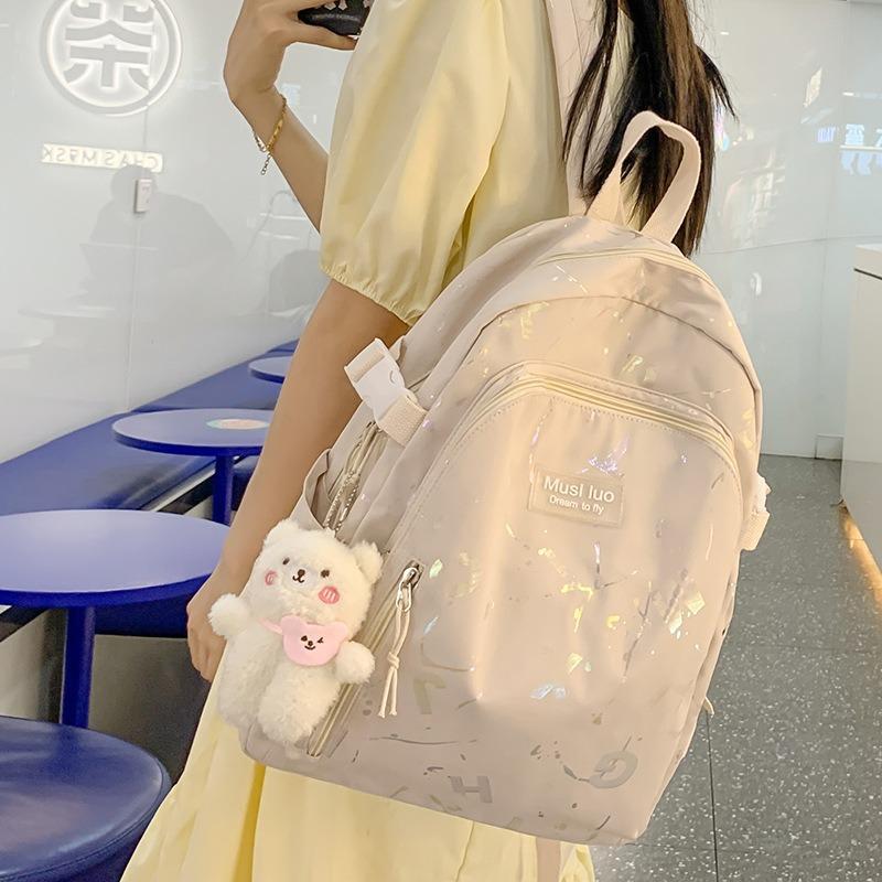 School bag women's new style graffiti school bag women's casual letters junior high school students large-capacity backpack