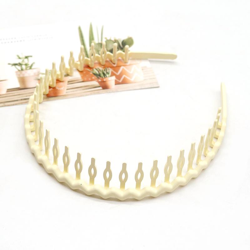 Buntes, wellenförmiges koreanisches Zahnkamm-Haarband - Rutschfest, schonend zum Haar, Bequemer Sitz, Ideal zum Bändigen von Babyhaaren.