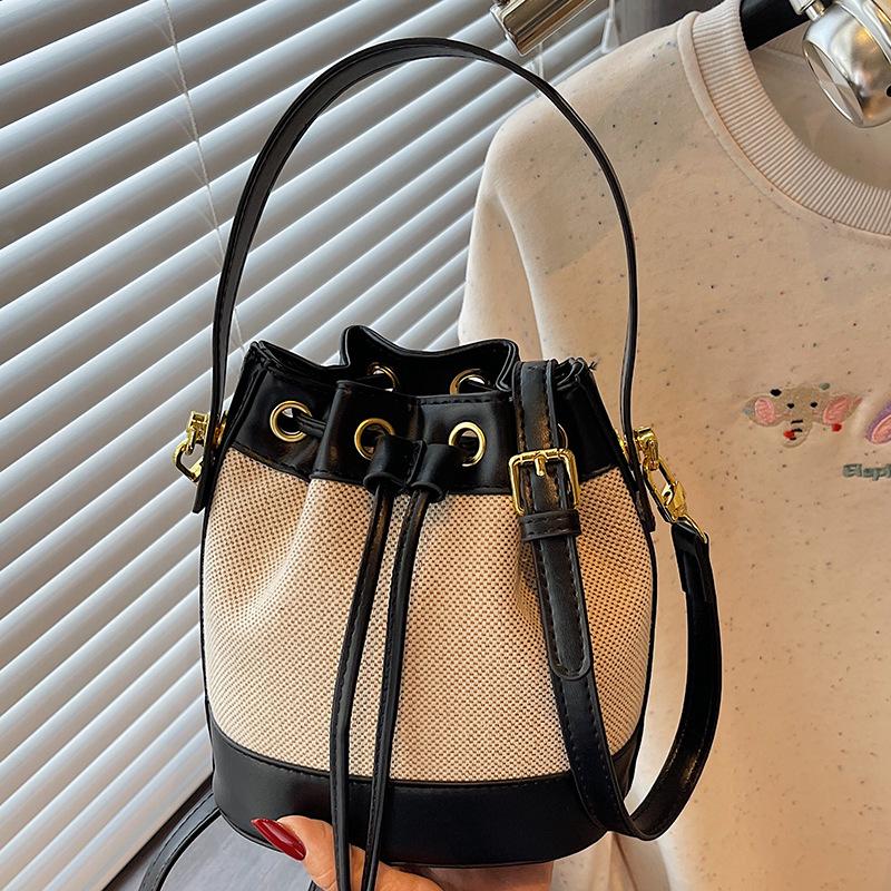 Fashion women's bags new niche high-value contrasting color shoulder messenger bag retro texture portable small bucket bag