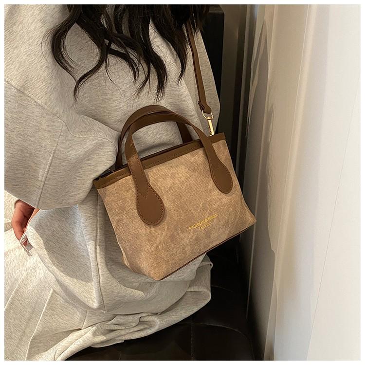 Nische High-End 2025 Herbst Schulter-Tote mit großem Fassungsvermögen: Vielseitige lässige Umhänge-Bucket-Bag