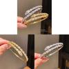 Bracciale di lusso a forma di serpente in rame placcato oro con accenti di zirconi per fashioniste