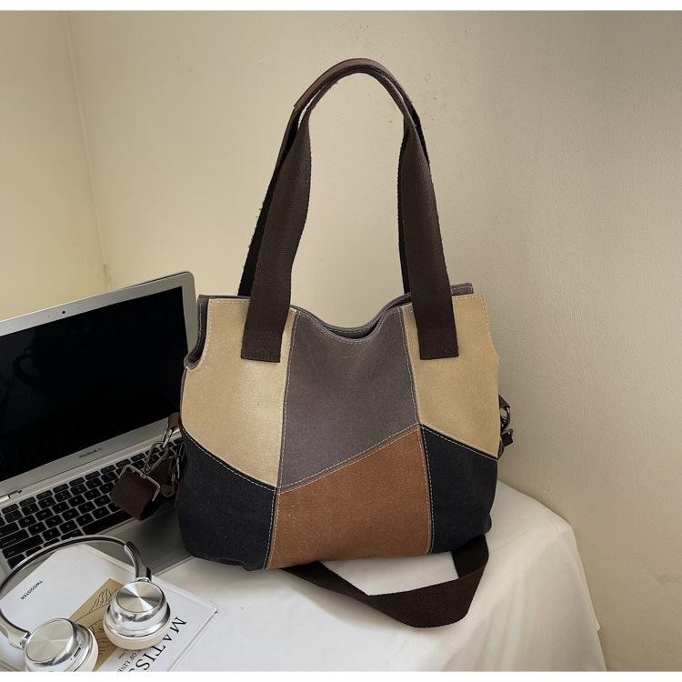 Canvas bag women's bag new Korean version of fashion leisure travel shoulder bag large capacity versatile women's portable messenger bag