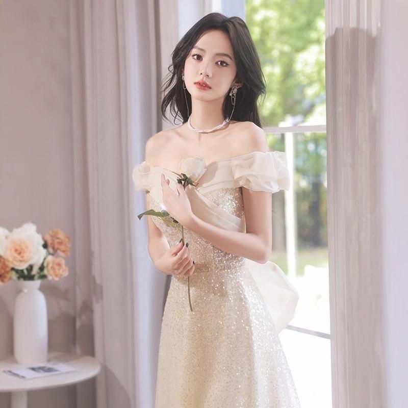 One-word shoulder evening dress skirt 1011 new temperament light luxury niche champagne color super fairy host evening dress