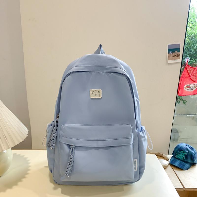 New Niche Primary School Students Boys and Girls Universal Large-capacity Lightweight Simple Korean Version Solid Color Large-capacity Schoolbag